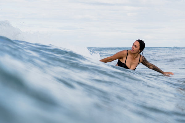 comfortable sustainable bikini top good for surfing and playing in the waves. Zero waste, made in new zealand from recycled fabrics. High quality